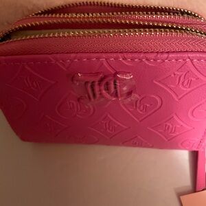Juicy Couture wallet pink with credit card slots and bill section zip coin area.